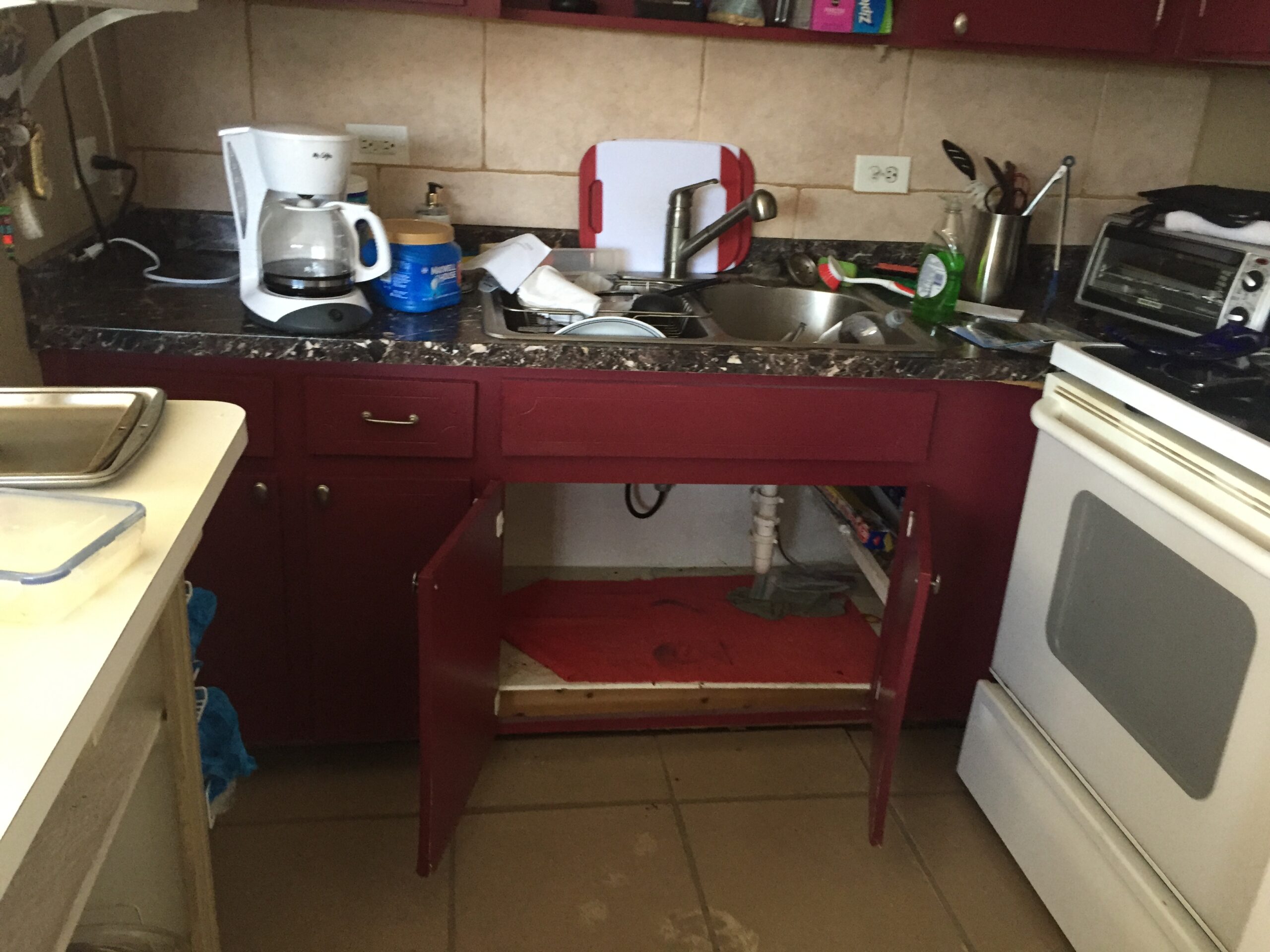 Muddy, contaminated kitchen after hurricane flooding